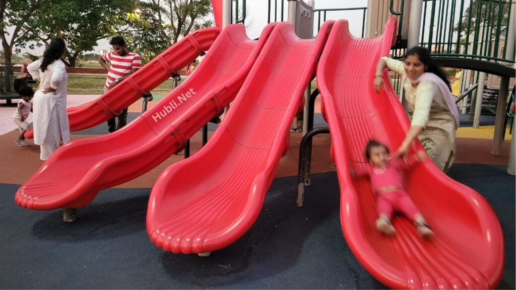 Slides at the dedicated kids play area in Tolankere